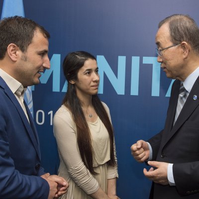 Image: Nadia Murad and Yazda deputy executive director Ahmed Khudida Burjus (left), met UN  Secretary General Ban Ki-moon in December 2015  after Ms Murad spoke at the UN Security Council’s first-ever session on human trafficking in armed conflict.